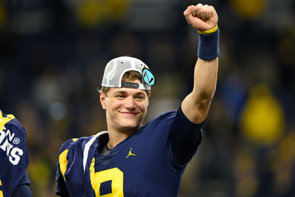 INDIANAPOLIS, IN - DECEMBER 03: Michigan Wolverines quarterback J.J. McCarthy (9) celebrates after the Big 10 Championship game between the Michigan Wolverines and Purdue Boilermakers on December 3, 2022, at Lucas Oil Stadium in Indianapolis, IN. (Photo by Zach Bolinger/Icon Sportswire)