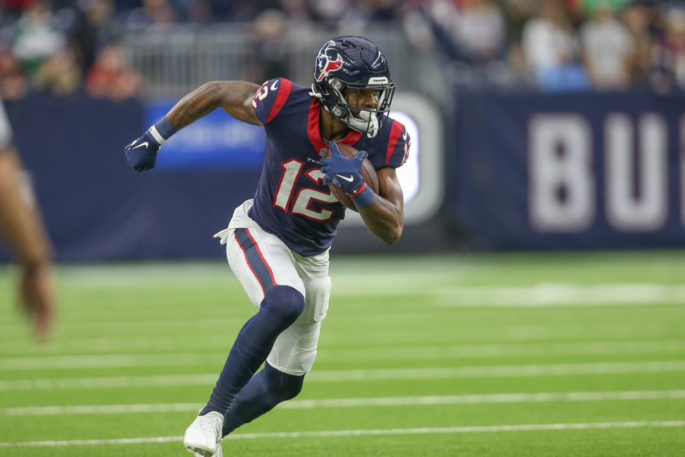 HOUSTON, TX - NOVEMBER 28: Houston Texans wide receiver Nico Collins (12) runs after a catch during the game between the Houston Texans and New York Jets on November 28, 2021 at NRG Stadium in Houston, TX. (Photo by George Walker/Icon Sportswire)